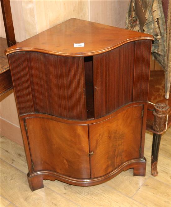 A George III mahogany serpentine corner cupboard, W.63cm